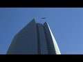 Men Tossed Around In High Winds on Skyscraper