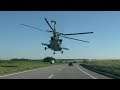 Helicopter Flying Between Cars