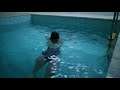 Sophie Turner One-Piece Black Swimsuit Pool Scene