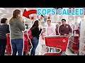 SHOPPING OUT OF PEOPLE'S CARTS ON BLACK FRIDAY! (COPS CALLED)