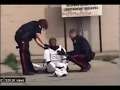 Coronavirus Lockdown: (Girl dressed up as a stormtrooper  cosplay  facing 3 cops with weapons drawn)