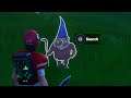 Search the hidden gnome found in between a race trach, a cabbage patch, and a farm sign - Fortnite