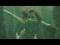 Clémence Poésy One-Piece Silver Swimsuit Underwater Scene