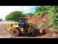 6-20-2021 Tuscaloosa, Al Crews cleaning large mudslide from road- washed out road from flood- drone
