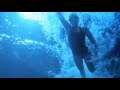 Clare Kramer One-Piece Black Swimsuit Underwater Scene