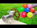 EXPERIMENT : GAINT M&M's VS MEAT GRINDER