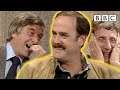 How real madness inspired a comedy legend | Fawlty Towers' John Cleese on Parkinson - BBC
