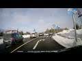 driver drives through turn lane into a roundabout