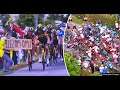 Tour de France VS Woman with Sign
