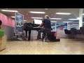 Piano being played at Amerdam Schiphol Airport (music)