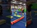 Little girls doing somersault and split gymnastics
